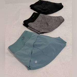 Lululemon 3pairs Speed up low rise lined shorts Size4 Black, Gray & pastel Green